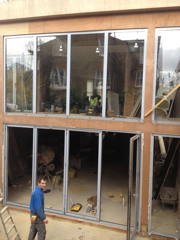 Aluminium bi-fold doors with two-storey glazing in Maidenhead