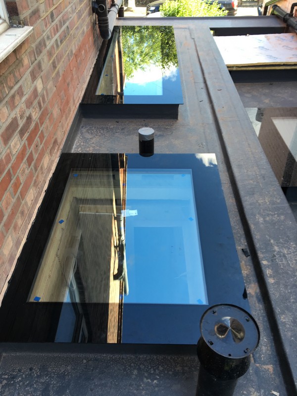 Multiple flat roof skylights on extension in Maidenhead