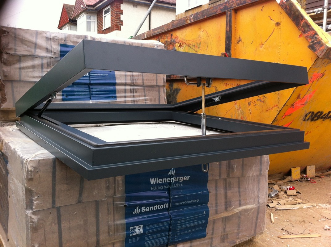 Opening flat roof skylight in anthracite grey installed in Maidenhead
