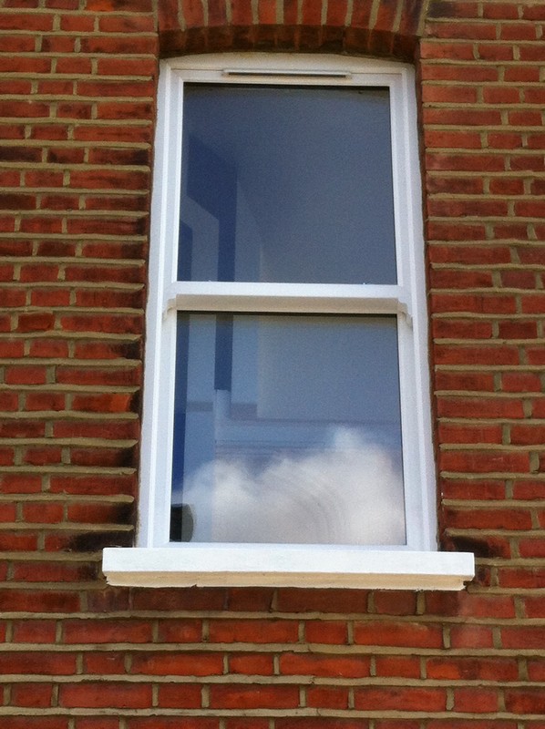 uPVC sash window on Victorian red brick house in Maidenhead